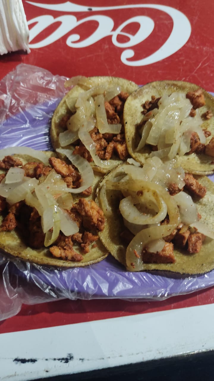 Tacos de iguana en adobo